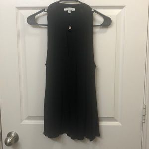 Black top with keyhole cutout in front